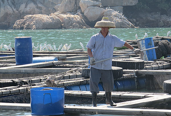 Fishermen and fishing raft